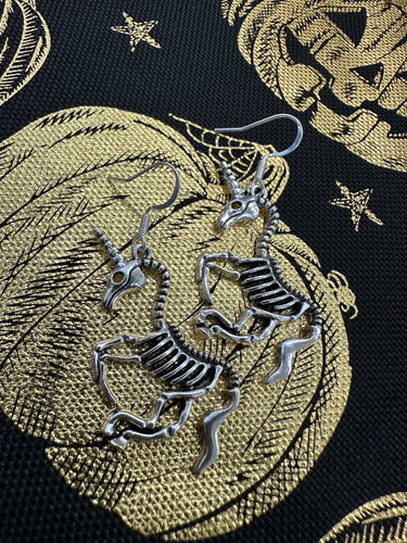 Unicorn skeleton earrings