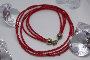 Long red necklace