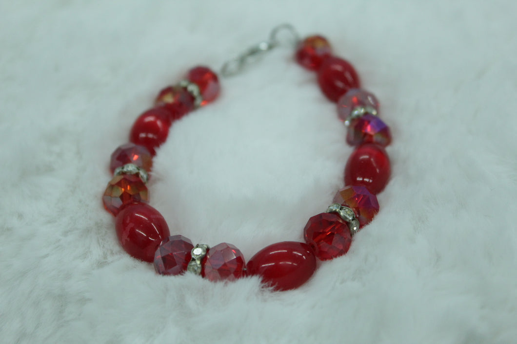 red beaded bracelet