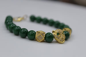 Lion bracelet (gold/green)