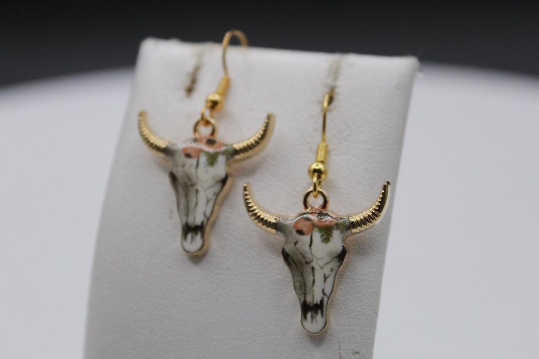 Orange flower cow earrings