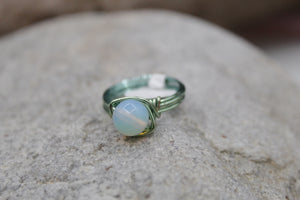 Man made opal ring